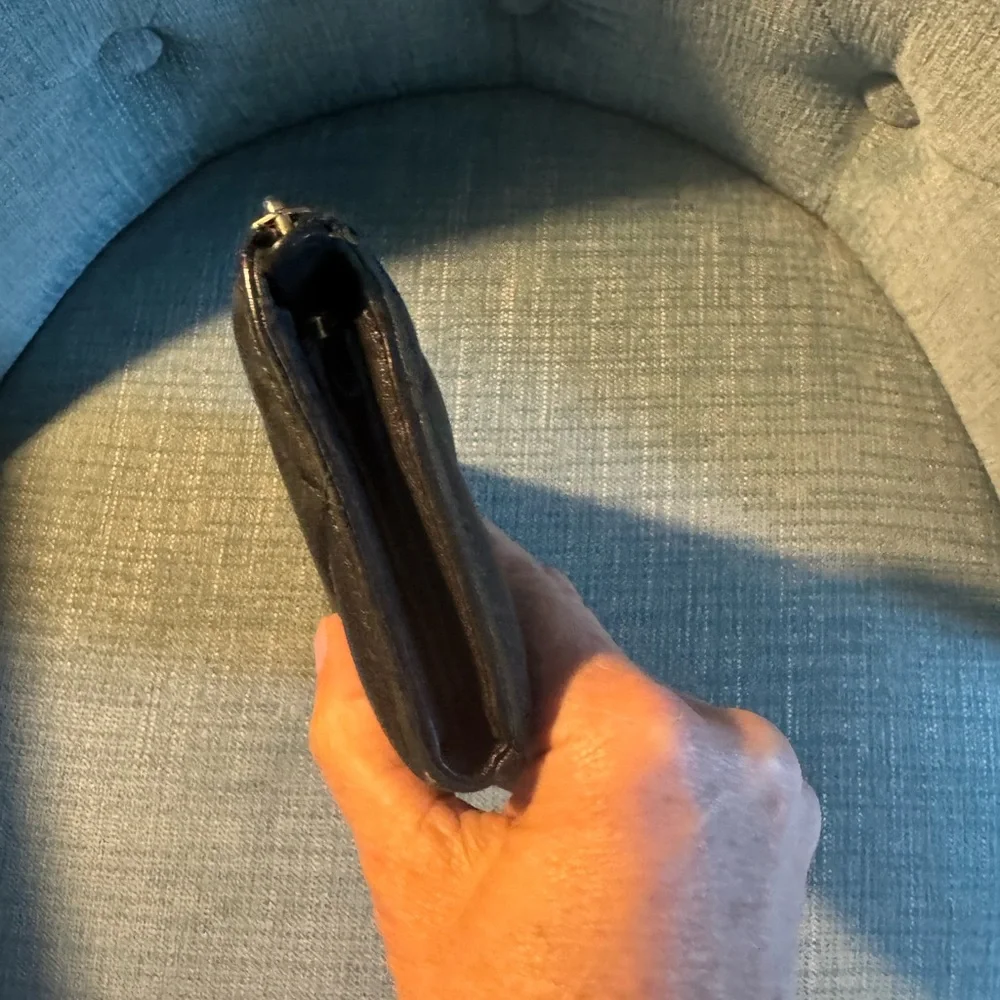 Salvatore Ferragamo Black Quilted Vara Zip Around Wallet with Gold Hardware. - Picture 6 of 9